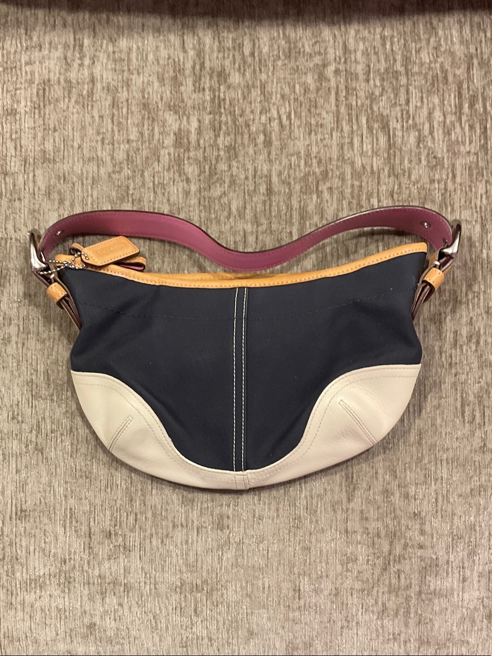 Vintage Coach Soho canvas and leather hobo bag.